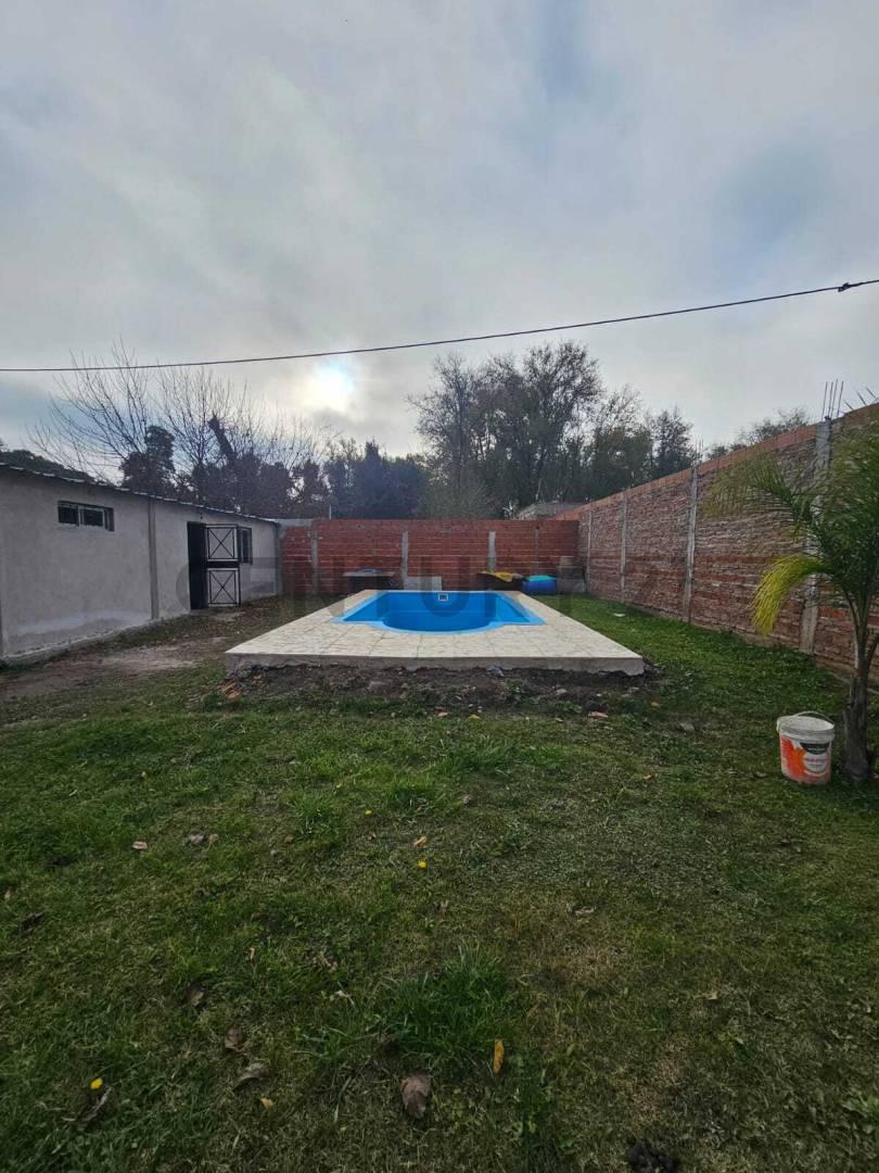 Terreno en venta en General Rodríguez Con construcción y pileta — foto 1