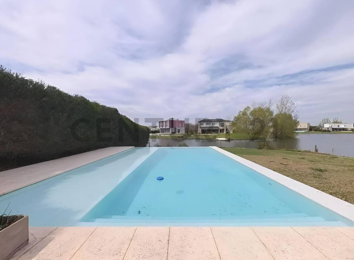Casa con Vista a la Laguna Principal y Pileta en Lote Esquina – El Cantón | Acepta Permuta en CABA — foto 1