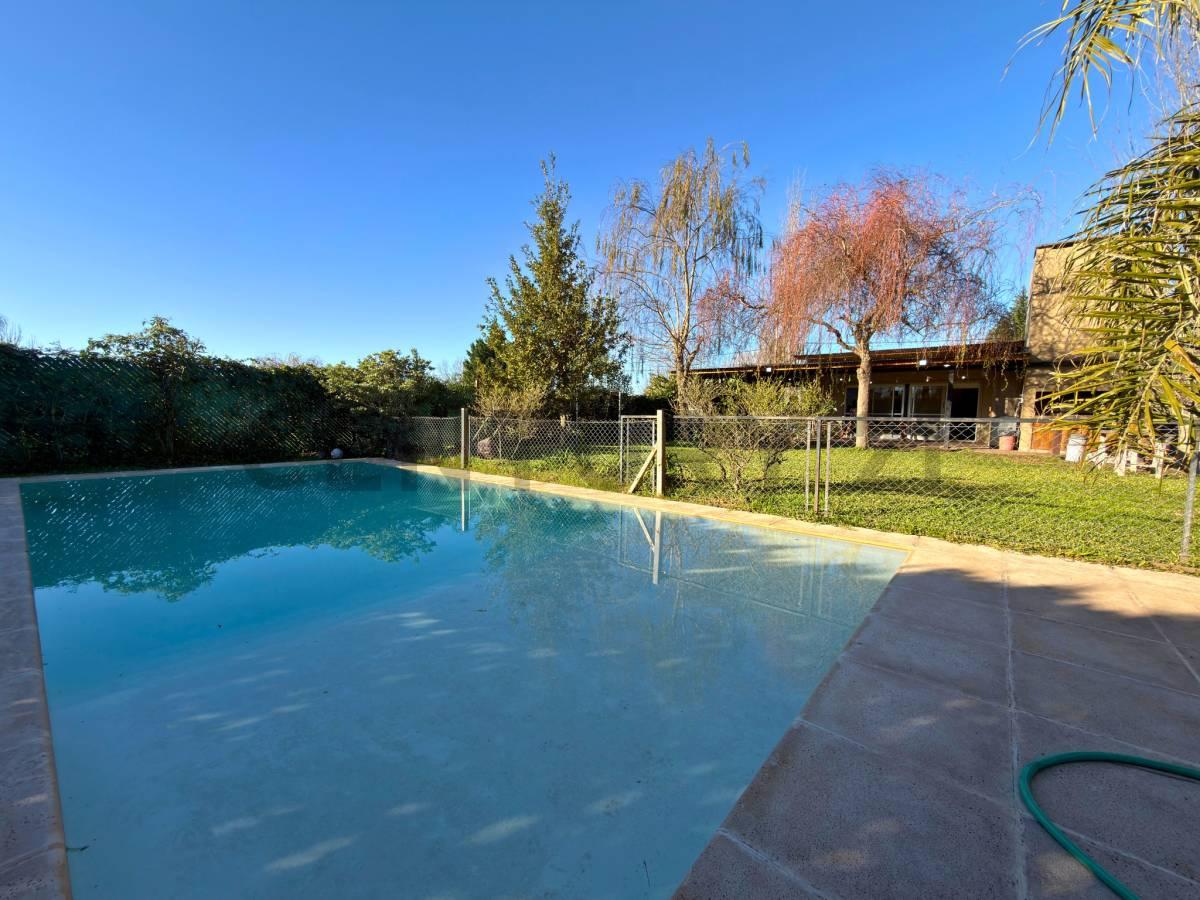 Venta | Casa de 2 Dormitorios con jardín y pileta en Punta Chacra, Roldán — foto 1