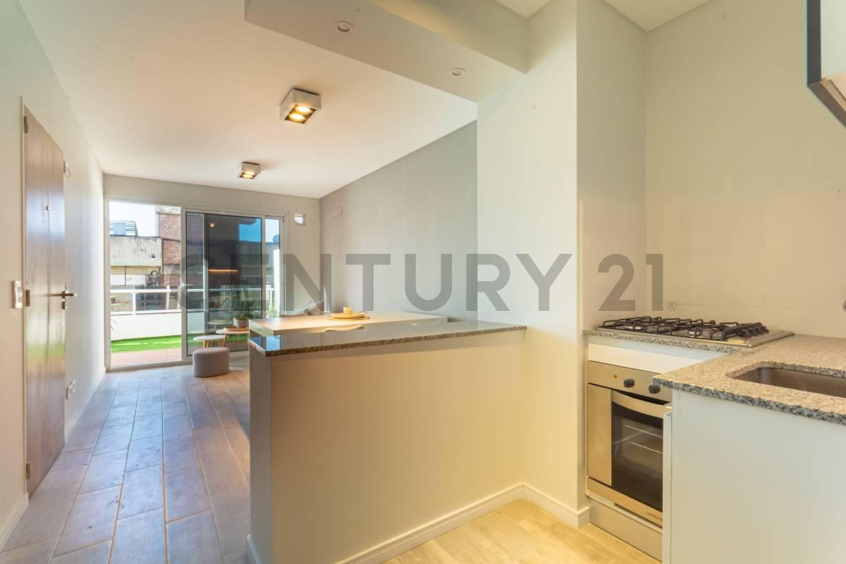 Venta Departamento de 1 Dormitorio con balcón y terraza exclusiva en Martin, Rosario — foto 1