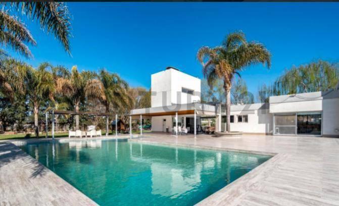 Venta de Casa de 7 ambientes en Barrio Privado Los Raigales - Roldan — foto 1