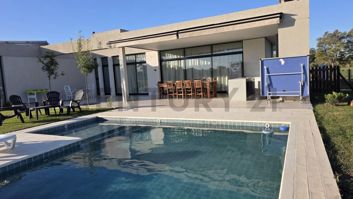 VENTA Casa 4 ambientes con escritorio, pileta y vista a arboleda | Barrio Norte, General Rodriguez — foto 1