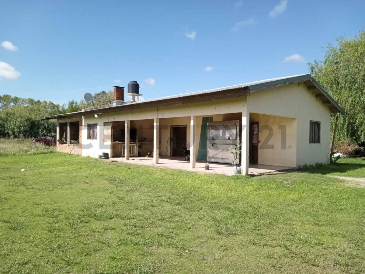 LOTE CON CASA A LA VENTA, RUTA 15 BERISSO — foto 1