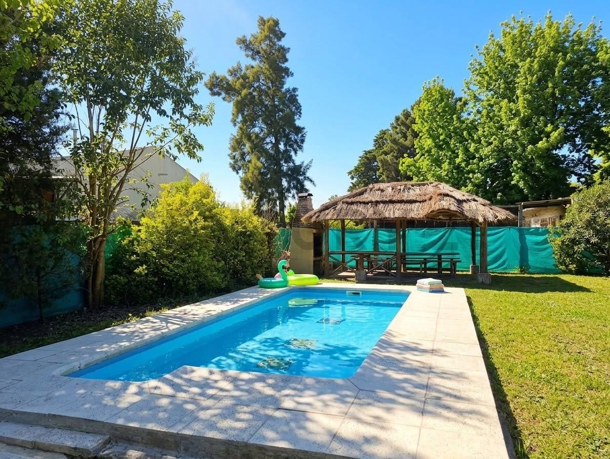 VENTA CASA 3 AMBIENTES GRAN LOTE-PILETA Y QUINCHO-PQUE SAKURA EX.DE LA CRUZ — foto 1