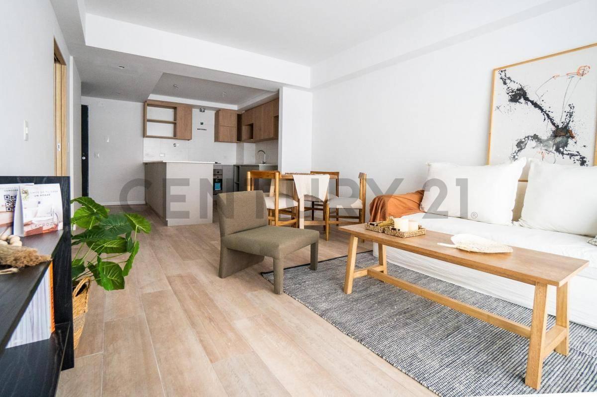 Venta depto 2 ambientes al frente c/ Patio aterrazado, Parrilla, Amenities y Aire Acondicionado — foto 1