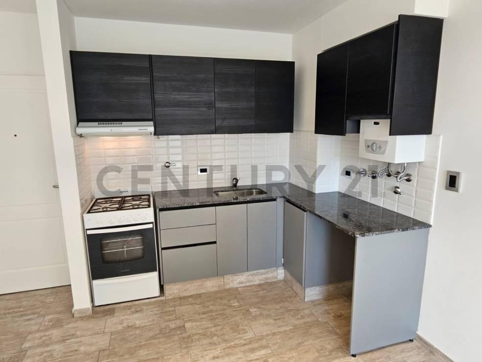 VENTA DEPARTAMENTO 1 DORMITORIO, BALCON AL FRENTE, PICHINCHA, ROSARIO — foto 1